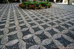Détail du sol en petits cailloux de la cour d'honneur du Palacio de Viana, Cordoba, Espagne.