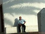 Ancien assis sur un banc, Vejer de la Frontera, Espagne.