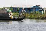 Geste du rameur, lac Tonlé Sap, Cambodge.