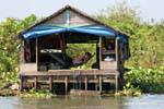 Sieste dans un hamac, Tonlé Sap, Cambodge.