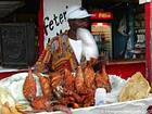 Vendeur de poisson frit et grillé, Boca Chica, Rép. Dominicaine.
