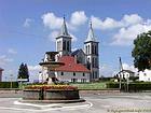 Fontaine sur la place devant l'Eglise de Boujailles, Franche-Comté, France.