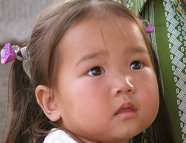 Enfant mongol
Petite fille assistant à un spectable de masque dans un temple à Ulan Batoor
Mots-clés: Mongolie