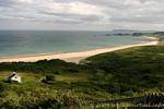 Plage, mer et nuages, White Bay, Antrim Coast, Irlande du Nord.