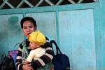La mère et son fils, Banyuwangi, Java, Indonésie.