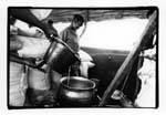 Cuisine à bord de la pinasse entre Mopti et Tombouctou, Mali.