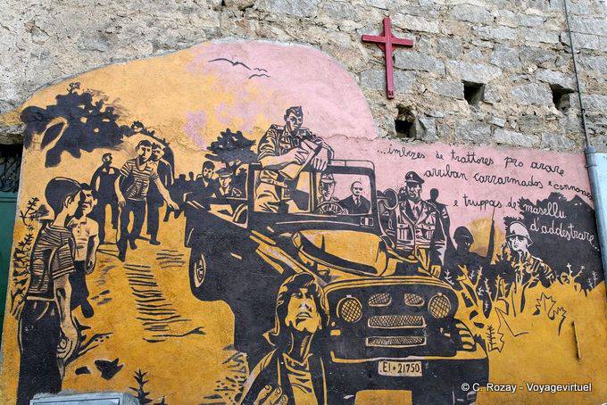 Orgosolo, sous la croix, l'arrivée des troupes, murales - Sardaigne
