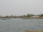 L'arrivée au petit port du fleuve, Senegal.