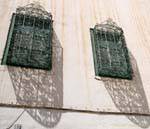 Ombre des ferronneries sur fenêtres, Sfax, Tunisie.